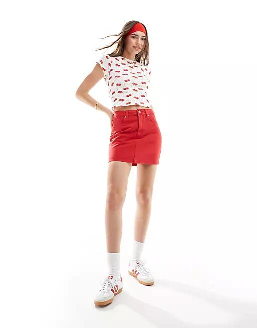 ASOS DESIGN denim high rise mini skirt in red Cover