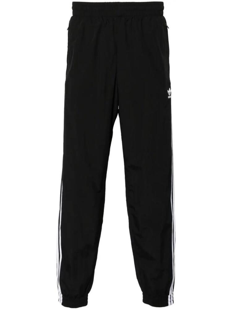 adidas trefoil-embroidered recycled polyamide track pants - Black Cover