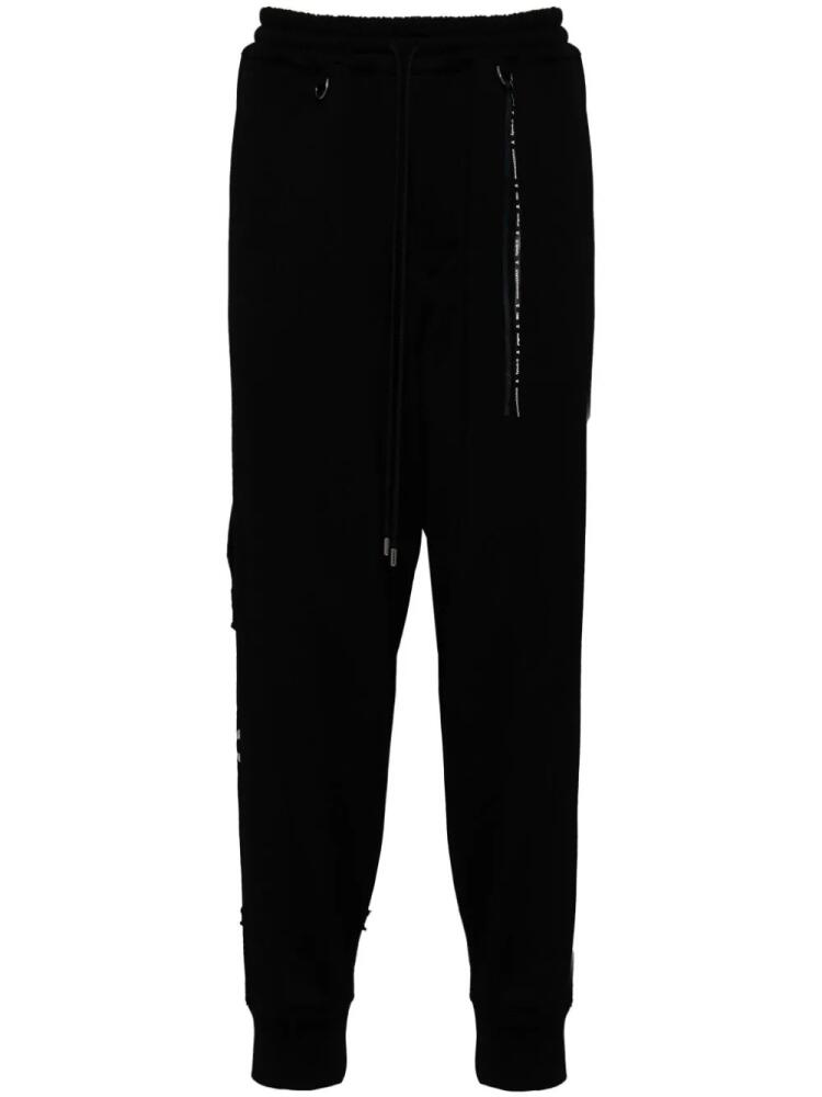 Mastermind Japan logo-printed track pants - Black Cover