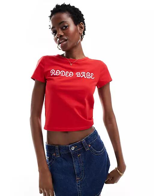 Monki shrunken t-shirt in red with rodeo babe front print Cover