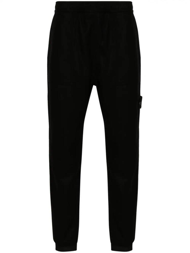 Stone Island tapered track pants - Black Cover