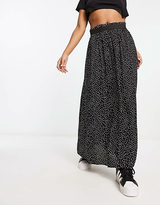 Only pleated midi skirt in black spot print Cover