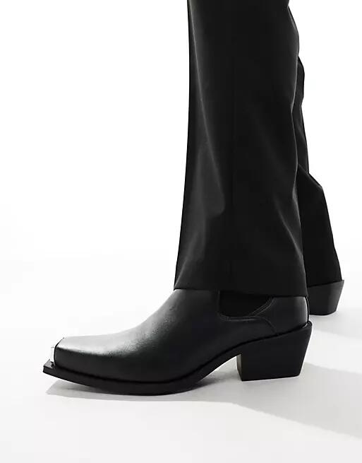 ASOS DESIGN cuban heel western chelsea boots in black faux leather with silver toe cap Cover