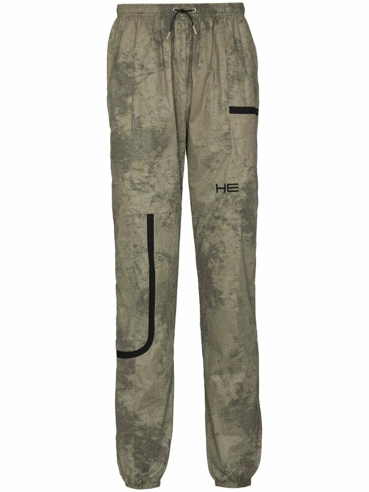 HELIOT EMIL camouflage-print track pants - Green Cover