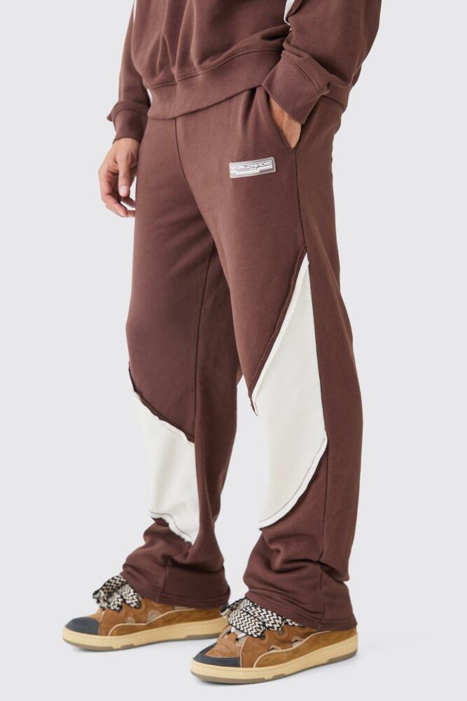 boohoo Mens Relaxed Loop Back Raw Hem Panel Sweatpant - Brown Cover