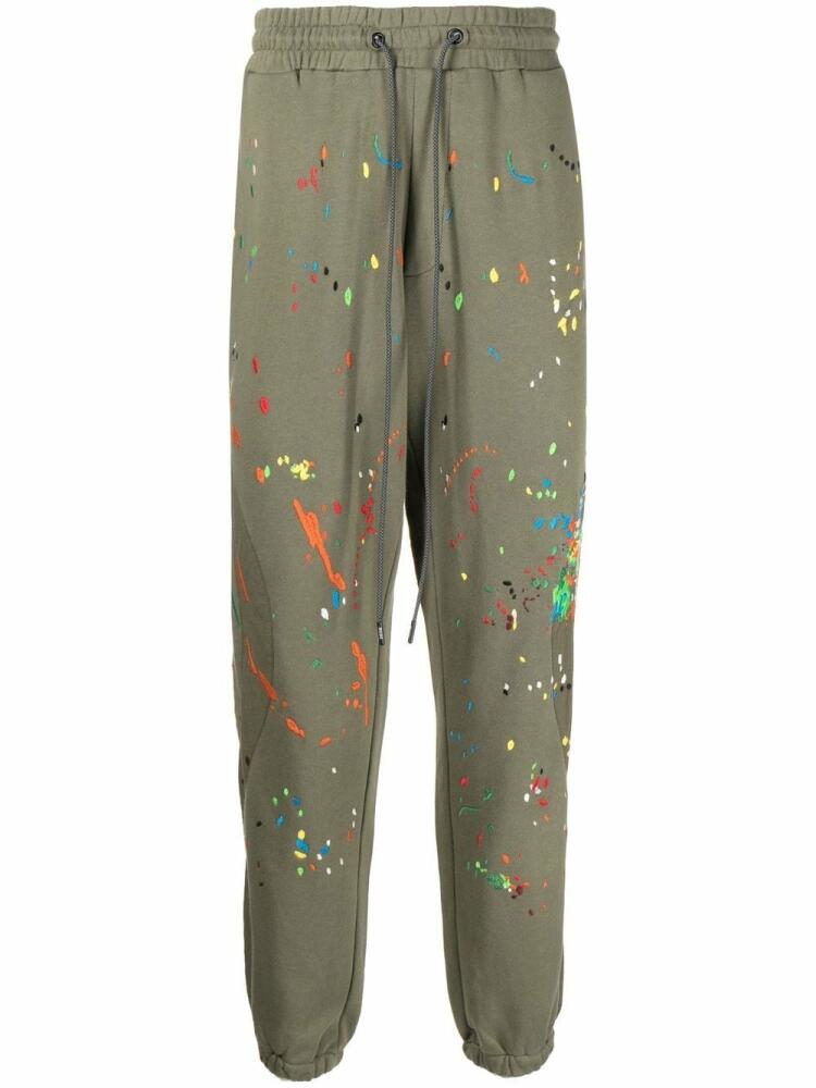 Mostly Heard Rarely Seen Warped paint splatter-embroidered joggers - Green Cover