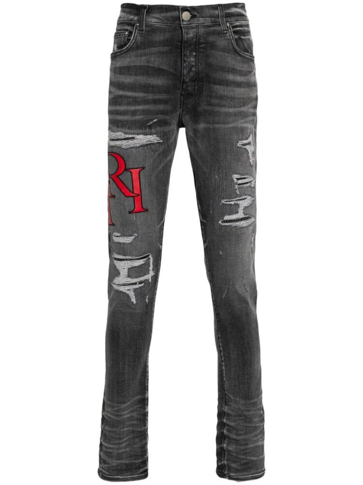 AMIRI distressed skinny jeans - Black Cover