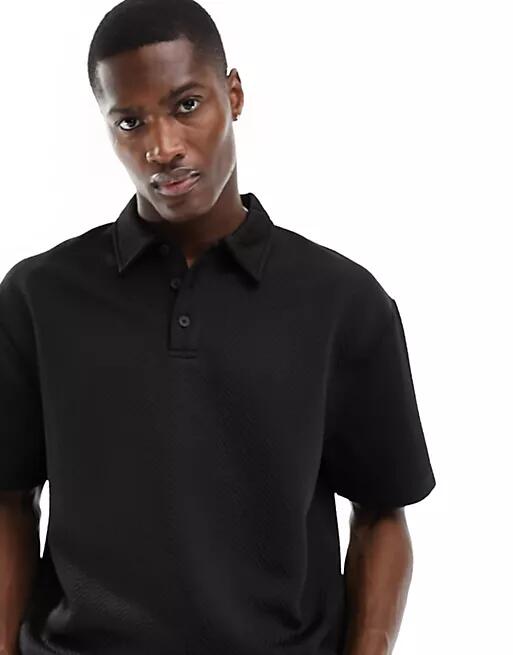 ASOS DESIGN relaxed chevron textured polo in black Cover