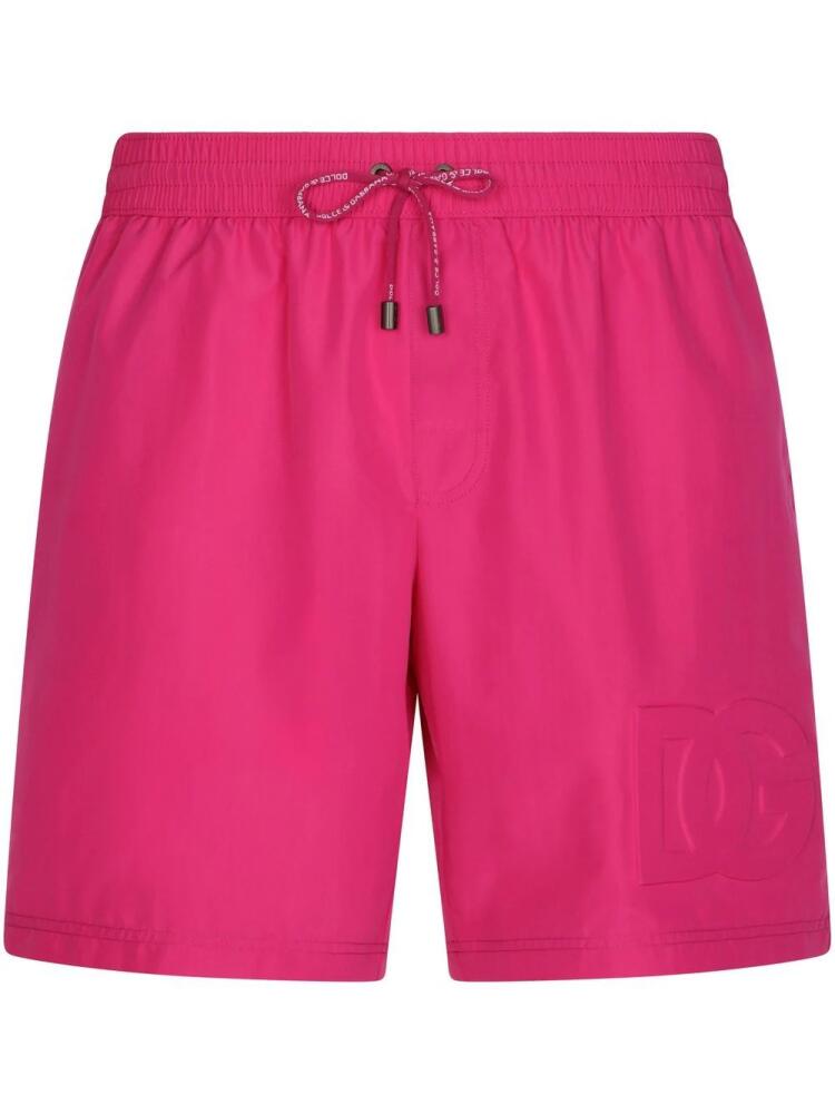 Dolce & Gabbana embossed-logo swimming shorts - Pink Cover