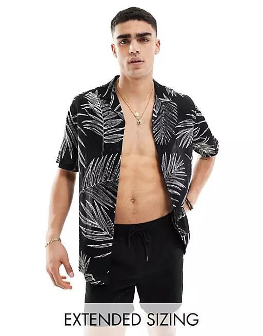 ASOS DESIGN relaxed revere shirt with leaf print in black Cover