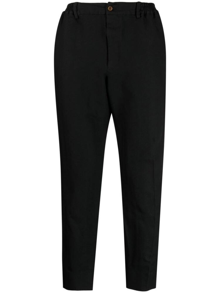 Black Comme Des Garçons chevron-pattern tapered trousers Cover