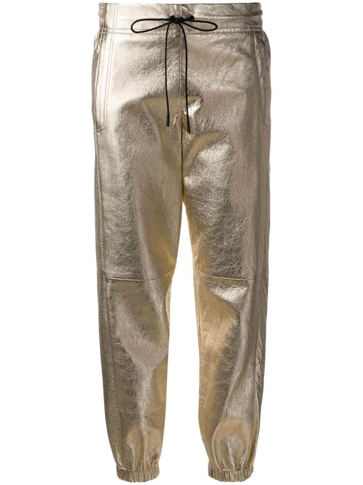 Saint Laurent metallic track pants - Gold Cover