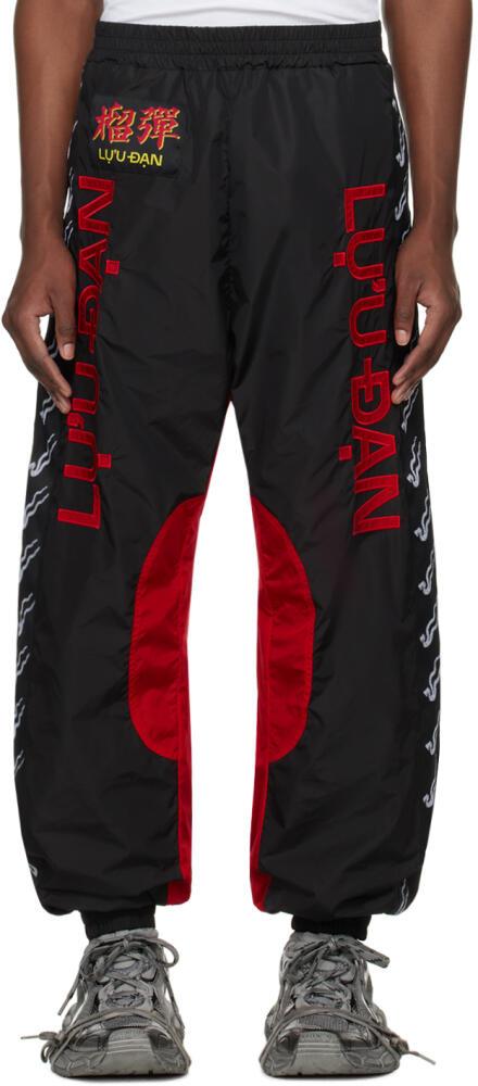 LU'U DAN Black & Red Shell Track Pants Cover