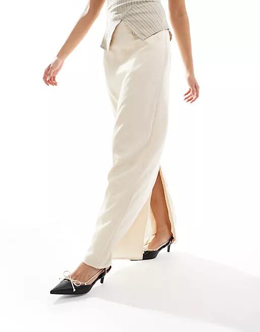 NA-KD x Laura Jade Stone maxi skirt with front pockets and back slit detail in beige-Neutral Cover