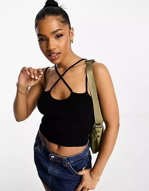 ASOS DESIGN knitted cami with crossover strap in black Cover