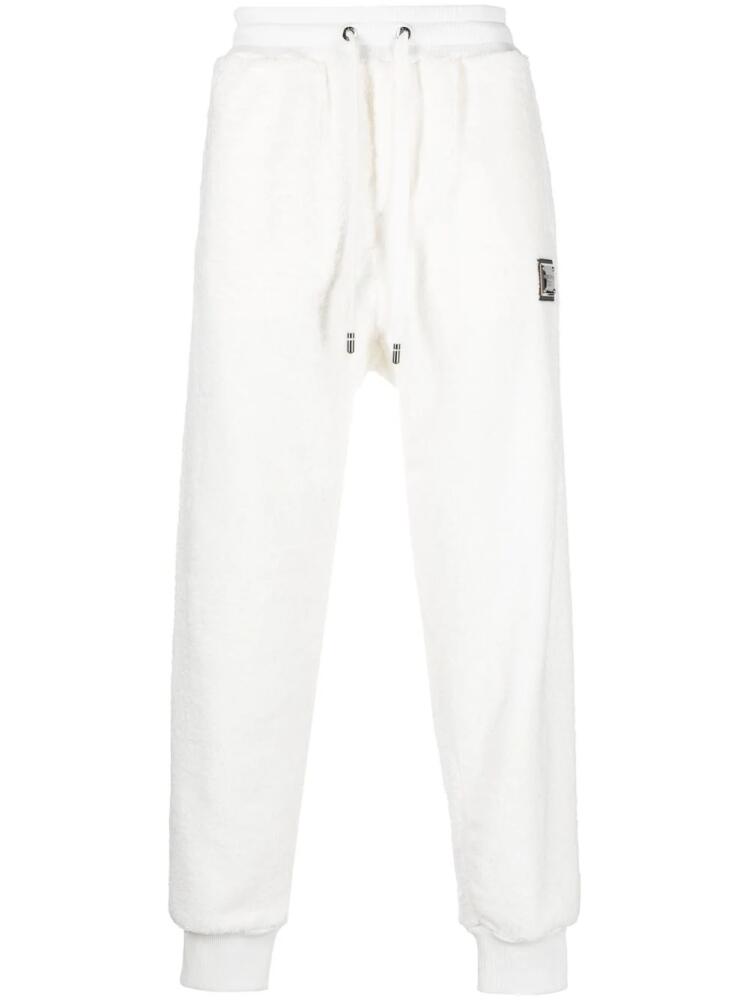 Dolce & Gabbana gold-tone logo cotton track pants - White Cover