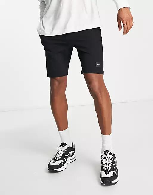 Only & Sons jersey shorts in black Cover