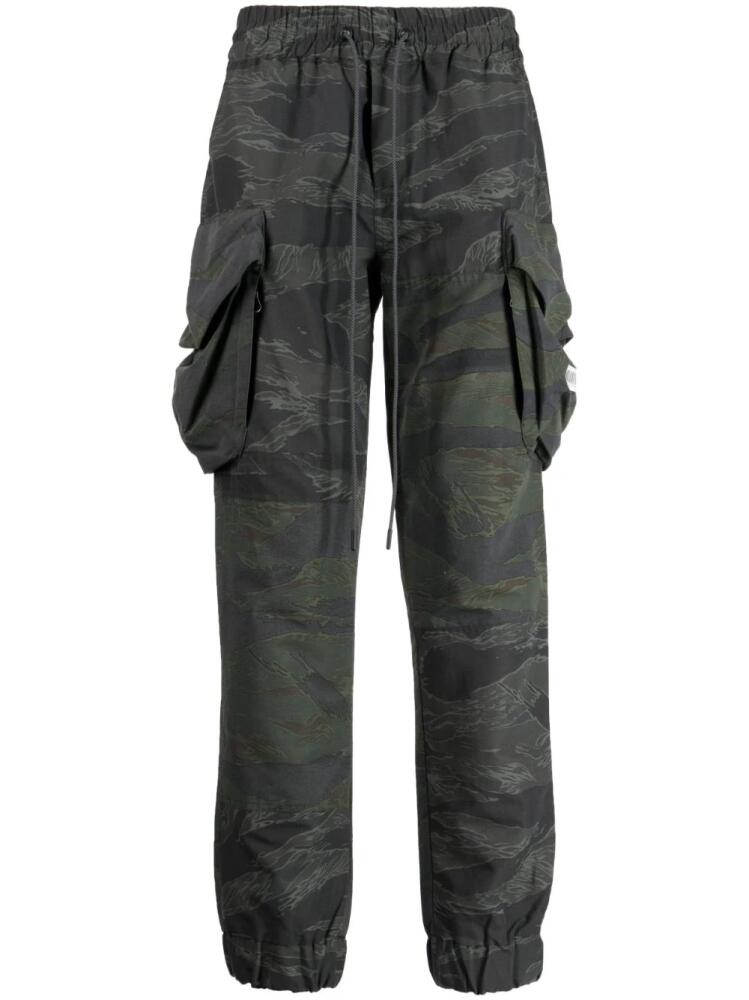 Mostly Heard Rarely Seen camouflage-pattern panelled cargo trousers - Green Cover