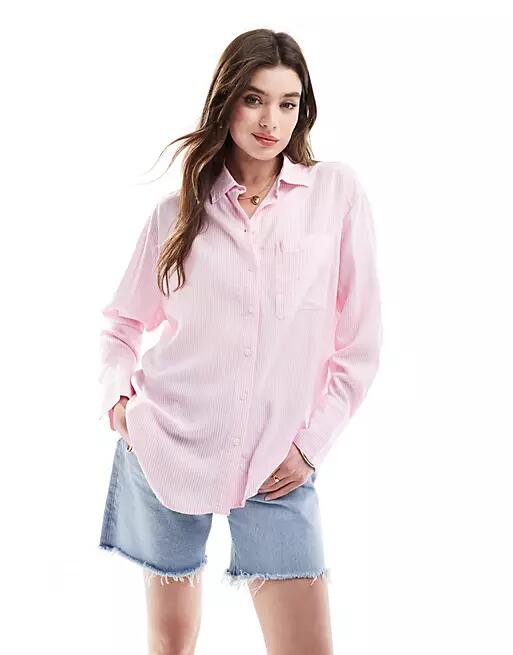 Bershka oversized striped shirt in pink Cover