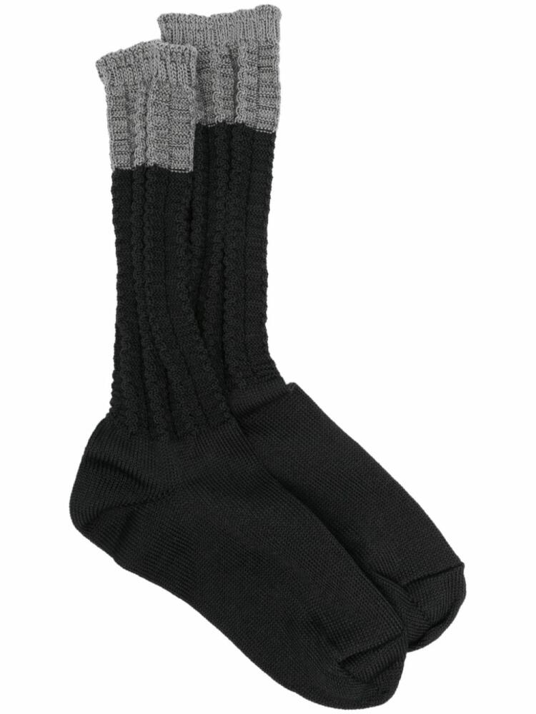 Homme Plissé Issey Miyake Churros socks - Black Cover