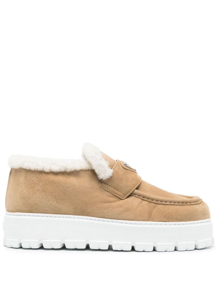 Prada triangle-logo shearling loafers - Neutrals Cover