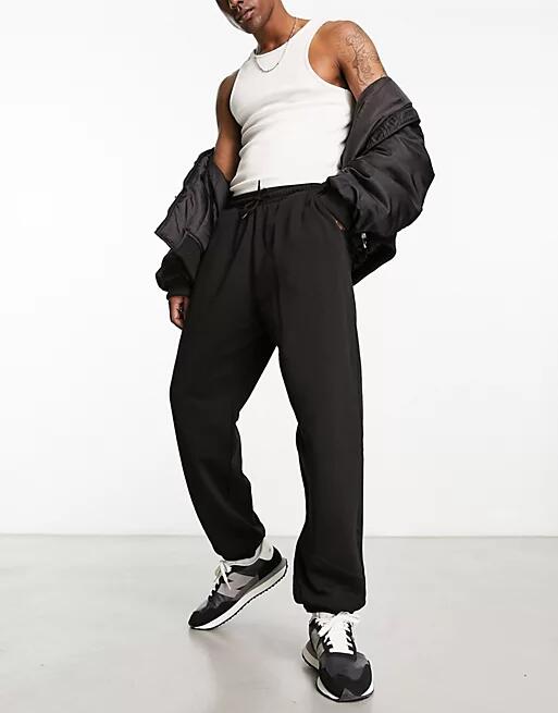 Weekday Standard sweatpants in black Cover