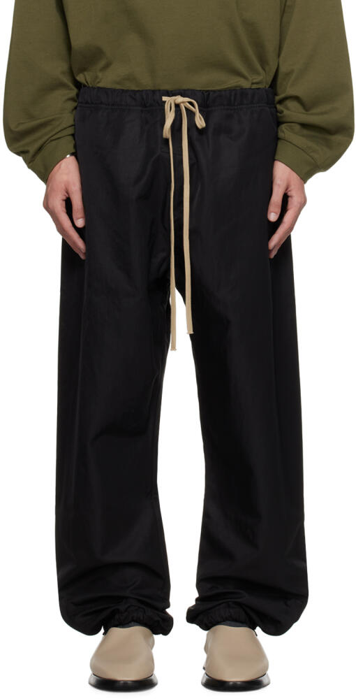 Fear of God ESSENTIALS Black Recycled Nylon Track Pants Cover