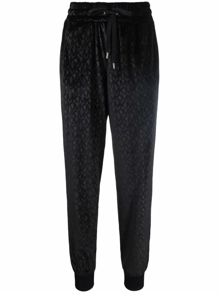 Michael Kors monogram-jacquard tapered track pants - Black Cover