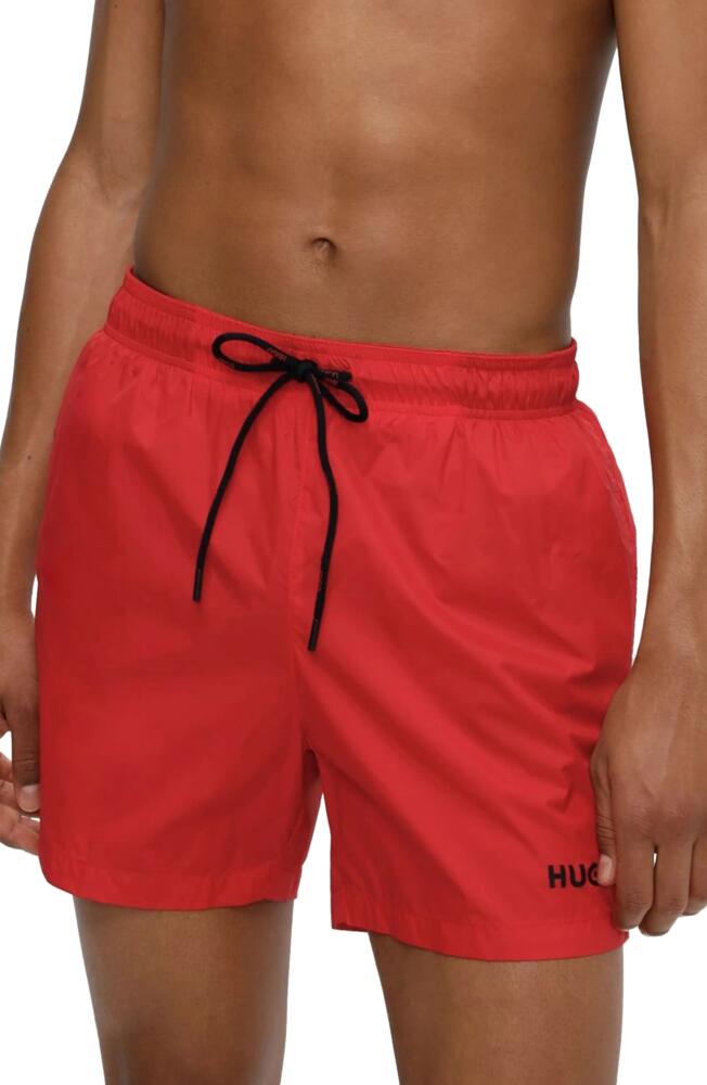 BOSS Haiti Recycled Polyamide Swim Trunks in Open Pink Cover