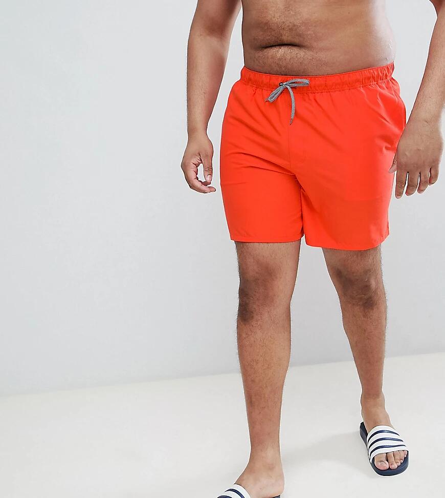 ASOS DESIGN Plus swim shorts in red in mid length Cover