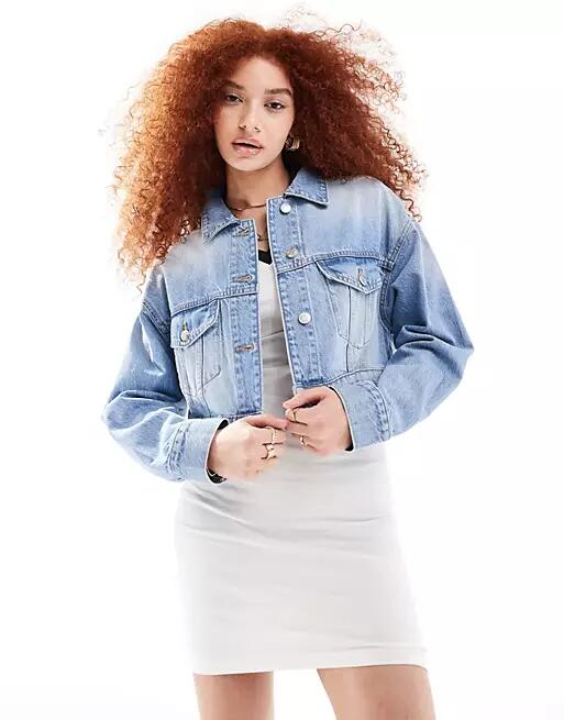 Bershka cropped denim jacket in mid blue Cover