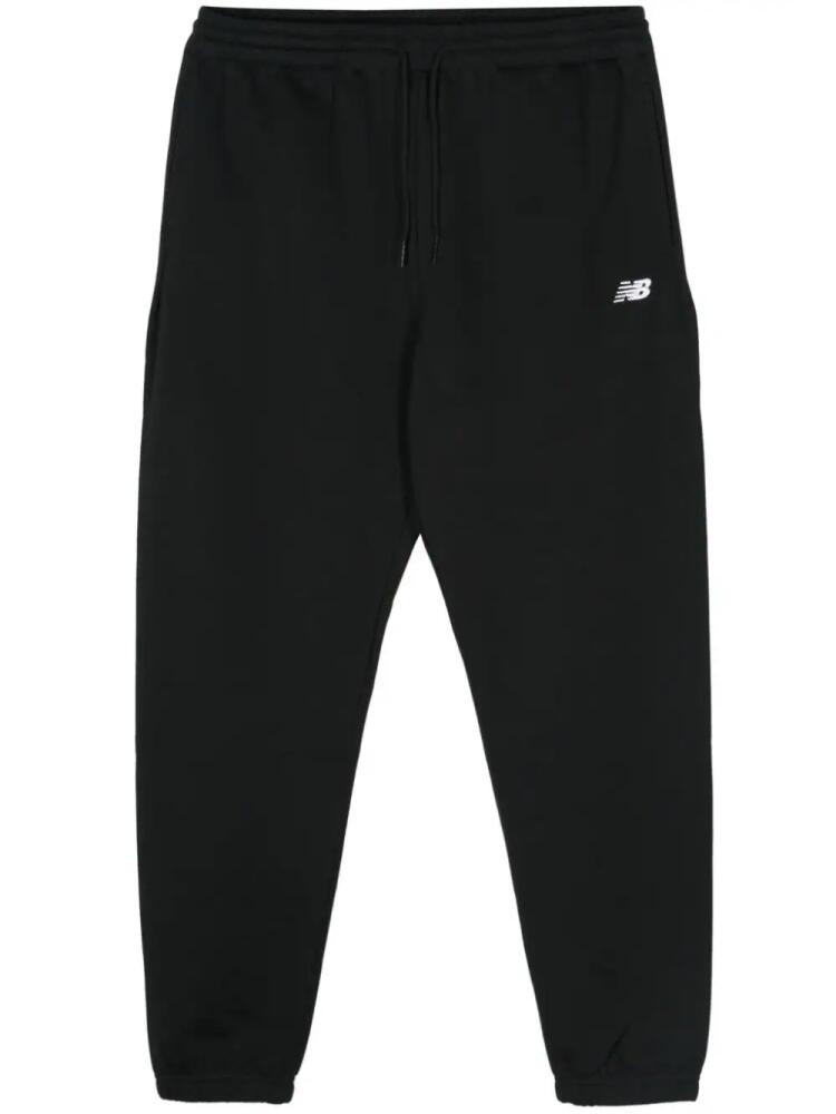 New Balance embroidered-logo jersey track pants - Black Cover