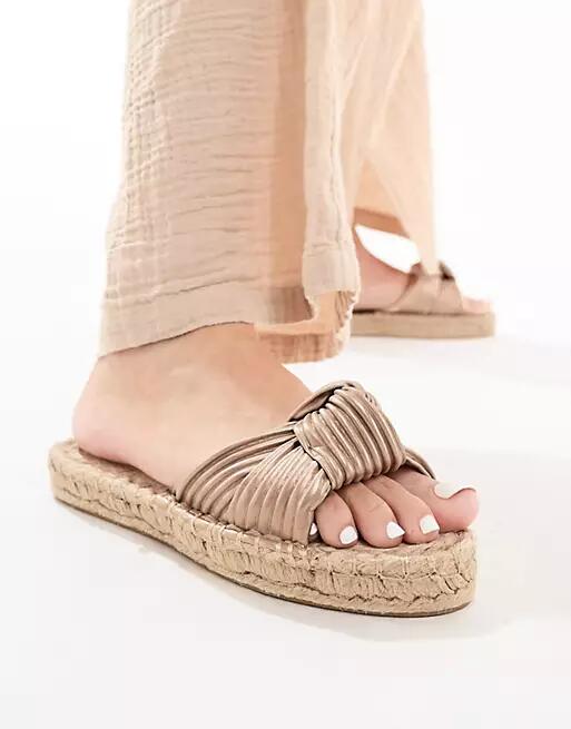 ASOS DESIGN Jade knotted espadrille mules in gold Cover