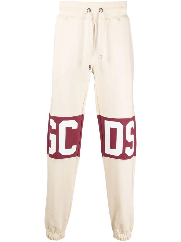 GCDS logo-print cotton track pants - Neutrals Cover