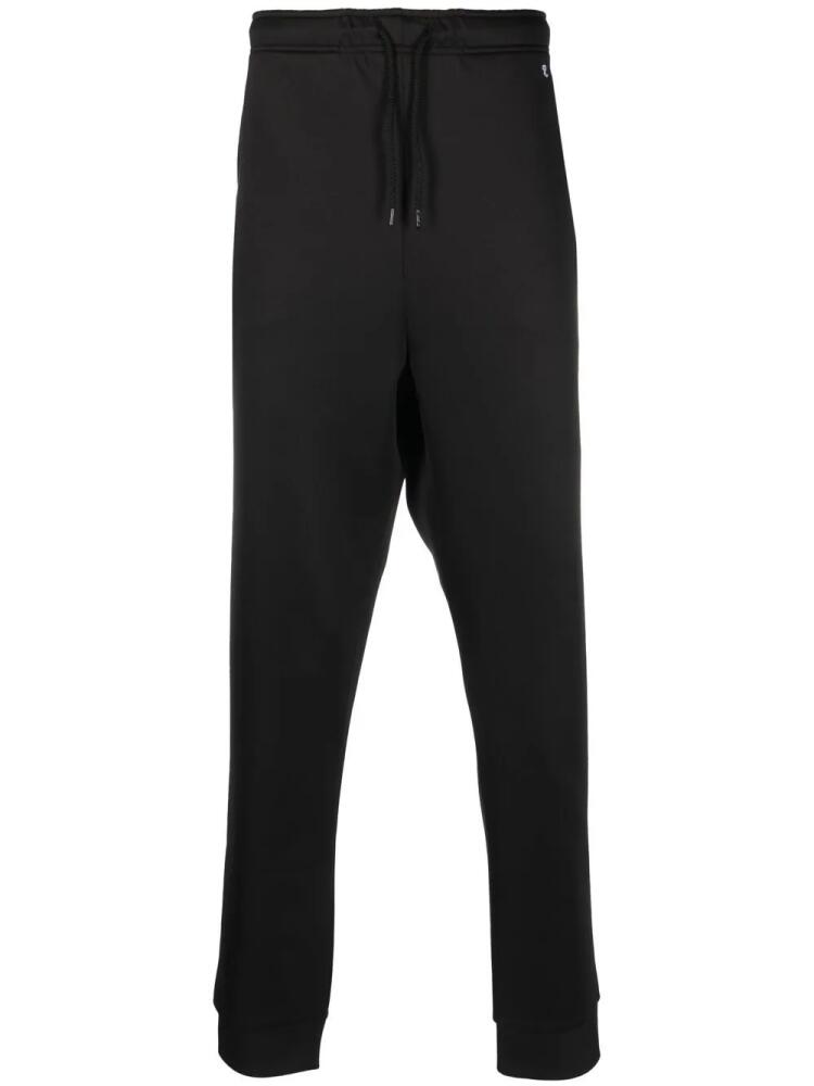 Raf Simons tapered track pants - Black Cover