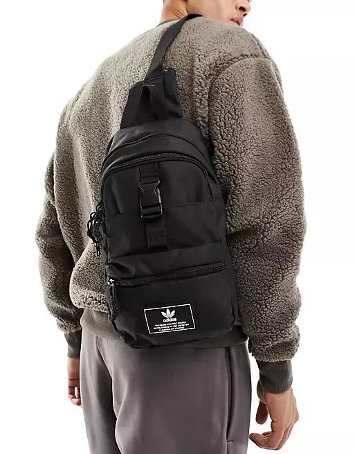 adidas Originals Utility 3.0 sling backpack in black Cover