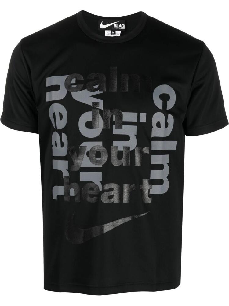 Black Comme Des Garçons slogan-print Swoosh T-shirt Cover