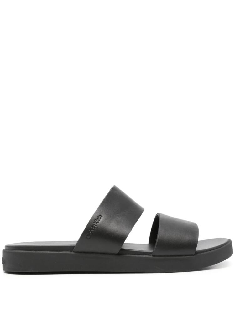 Calvin Klein logo-debossed leather slides - Black Cover