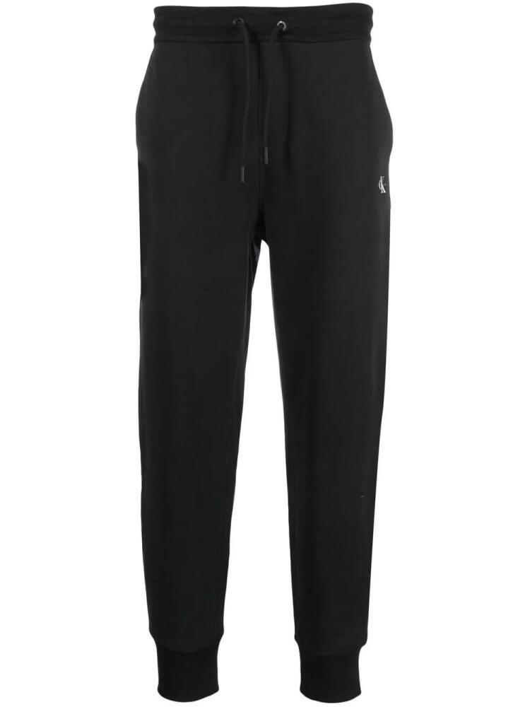 Calvin Klein Jeans logo-print cotton track trousers - Black Cover