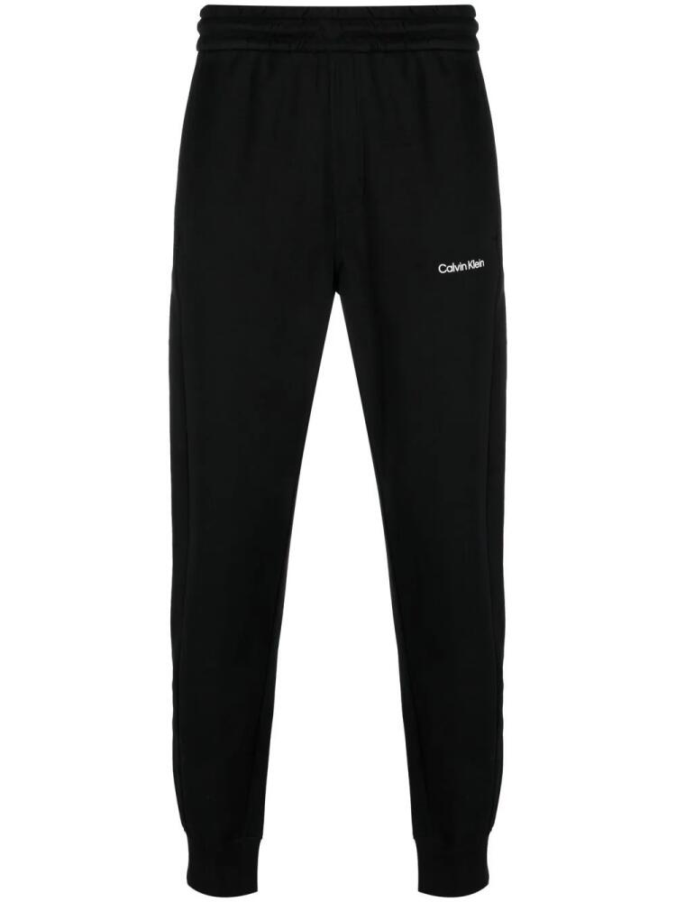 Calvin Klein logo-print track pants - Black Cover