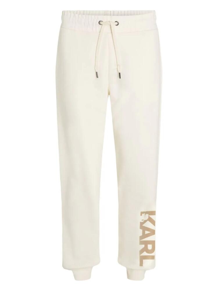 Karl Lagerfeld flocked-logo organic-cotton track pants - Neutrals Cover