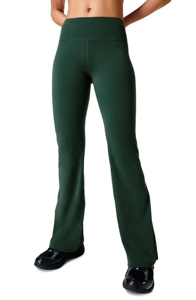 Sweaty Betty Power Kick Flare Workout Pants in Trek Green Cover