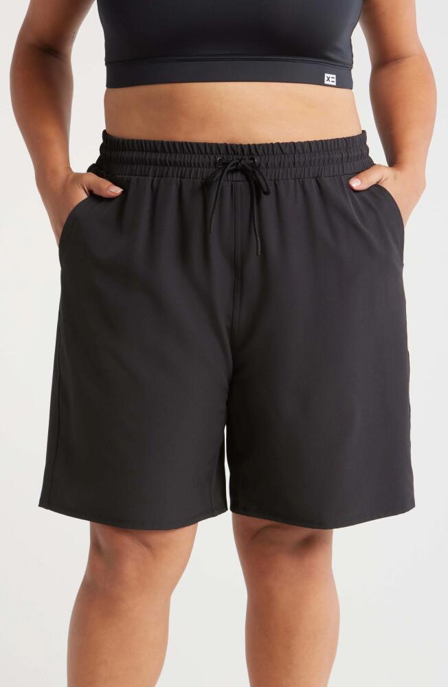 TomboyX 9-Inch Lined Board Shorts in Black Novelty Cover