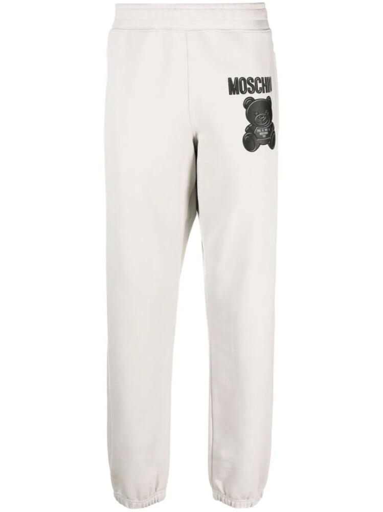 Moschino Teddy Bear-print organic-cotton track pants - Grey Cover