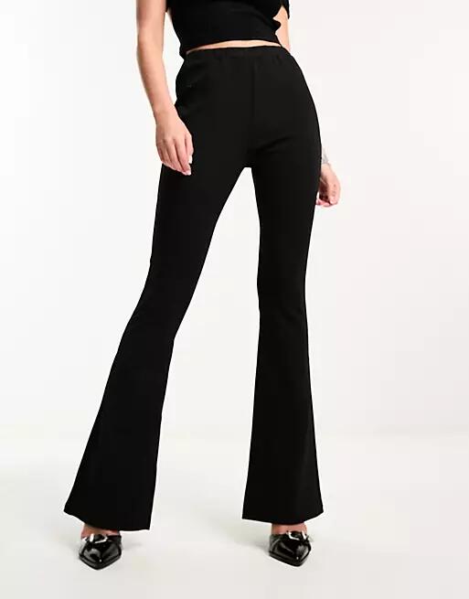 ASOS DESIGN Hourglass slim kick flare suit pants in black Cover