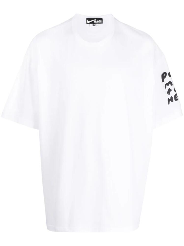 Black Comme Des Garçons slogan-print T-shirt - White Cover