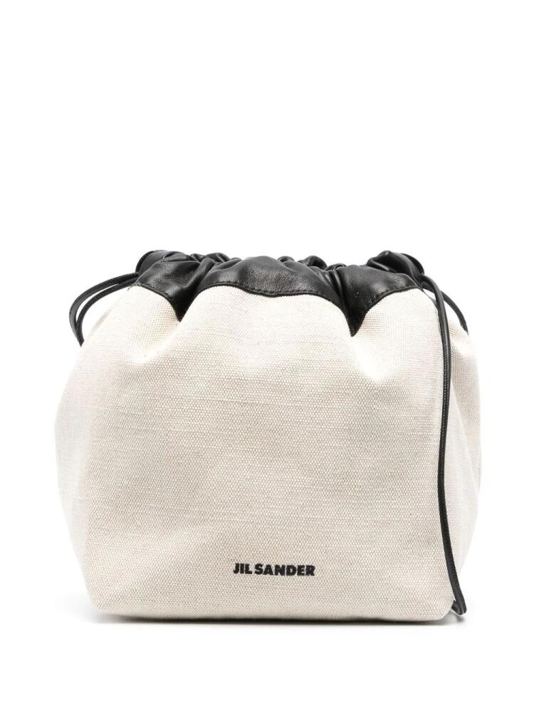 Jil Sander logo-print bucket bag - Neutrals Cover