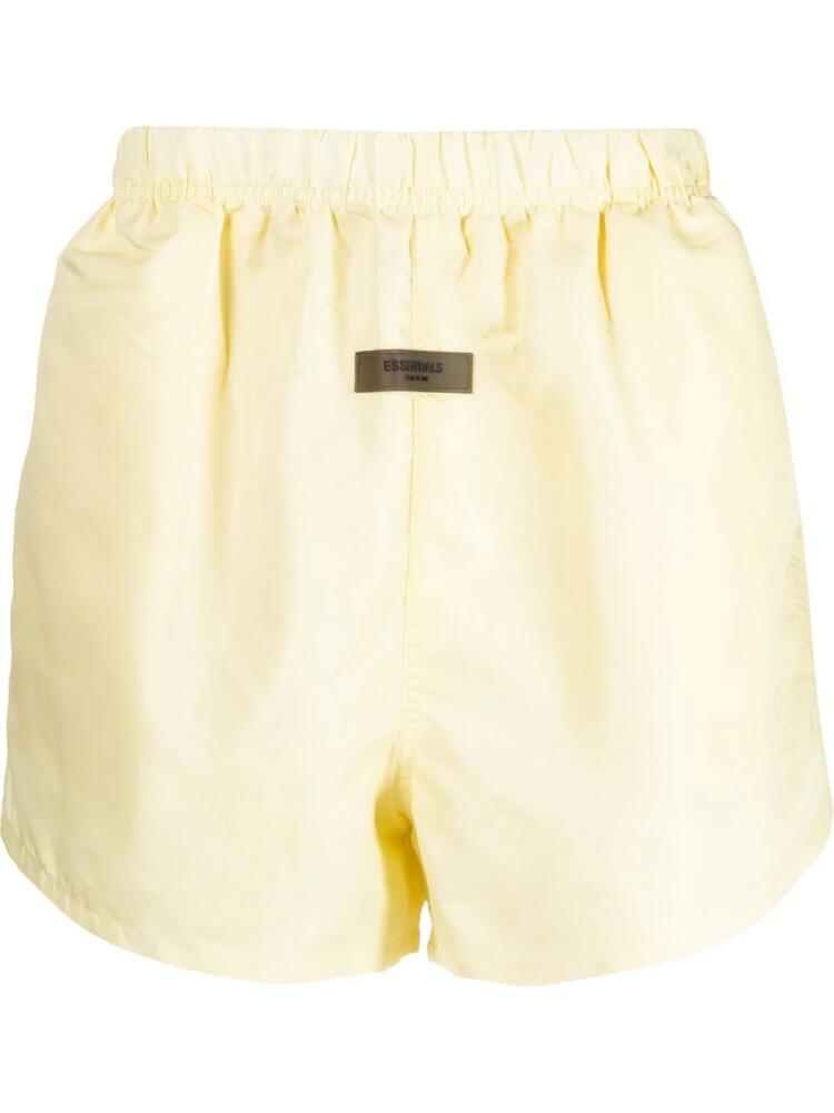 FEAR OF GOD ESSENTIALS logo-patch track shorts - Yellow Cover