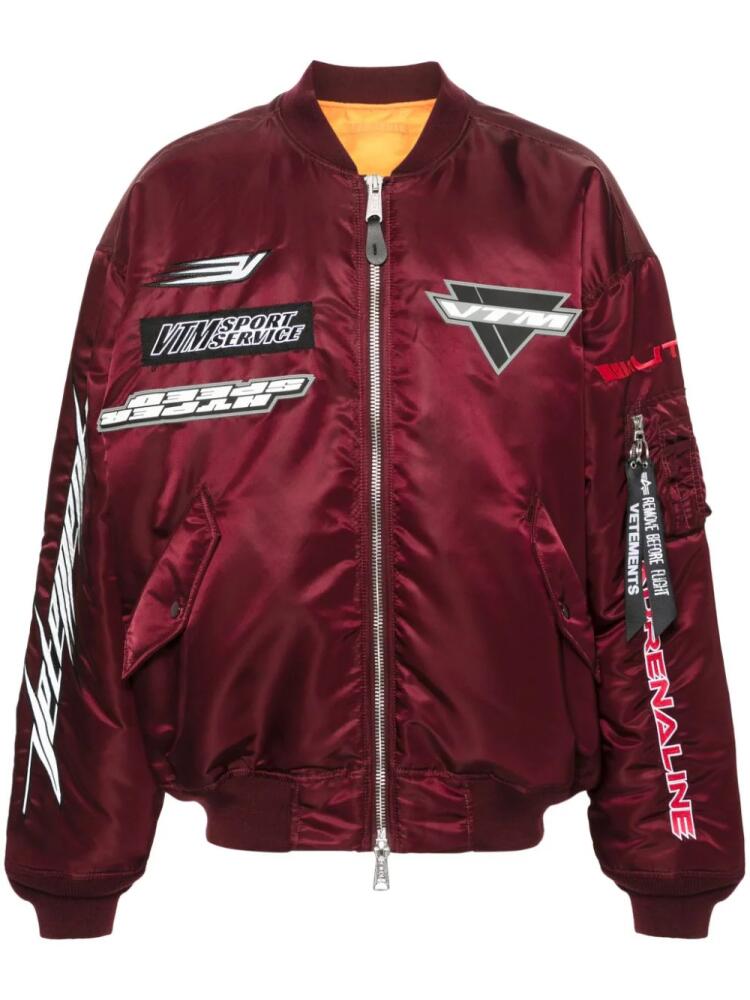 VETEMENTS logo-appliqué bomber jacket - Red Cover