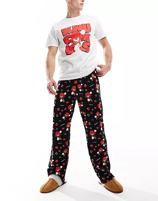 ASOS DESIGN Knuckles print pajama set in ecru and black Cover